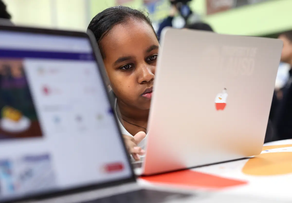 The AI moratorium applies to district-owned devices. There is not yet a district policy on what students can do on non-district devices, an official said.